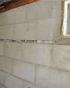 Severely buckling foundation walls in a home in Belvidere in need of repairs.