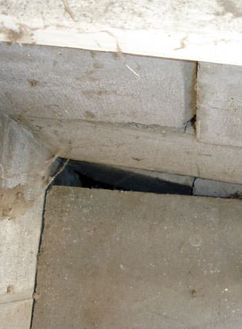 inward rotation of a foundation wall damaged by street creep in a garage in Fort Atkins