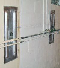 A foundation wall anchor system used to repair a basement wall in Reedsburg