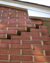 Serious damage to a foundation wall due to settlement of a home in Fitchburg