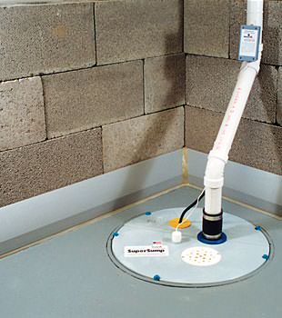 A baseboard basement drain pipe system installed in Beloit