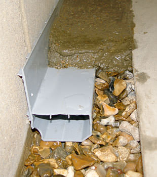 A basement drain system installed in a Eau Claire home