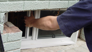 Installing new windows in a Kenosha finished basement