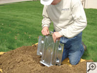 Steel earth anchor assembly installation in Menomonee Falls.