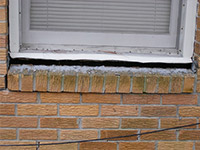 A window sill cracking and separating from the foundation wall in a Chippewa Falls home.