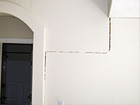 Drywall cracking due to foundation settlement in Belvidere