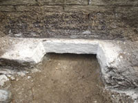 Preparing a foundation footing for helical pier installation in Waukesha
