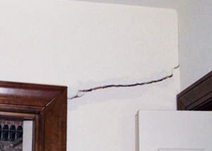 A large drywall crack in an interior wall in Waukesha