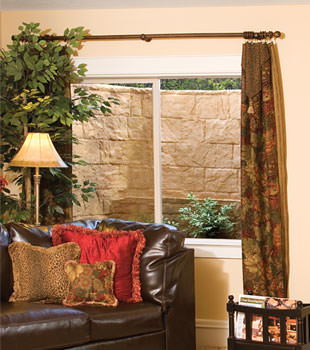 Our durable plastic window well installed in a finished basement in Waukesha.